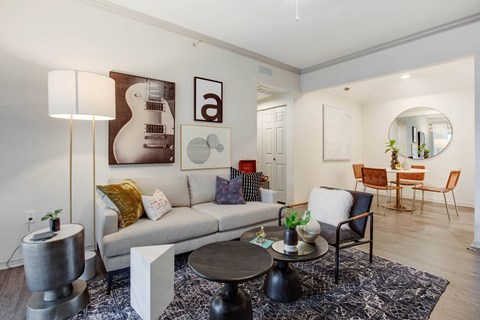 a living room with a couch and a table